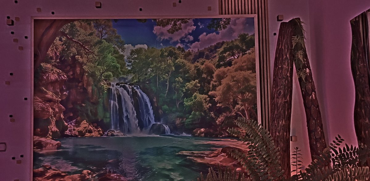 Welcome area with big waterfall poster